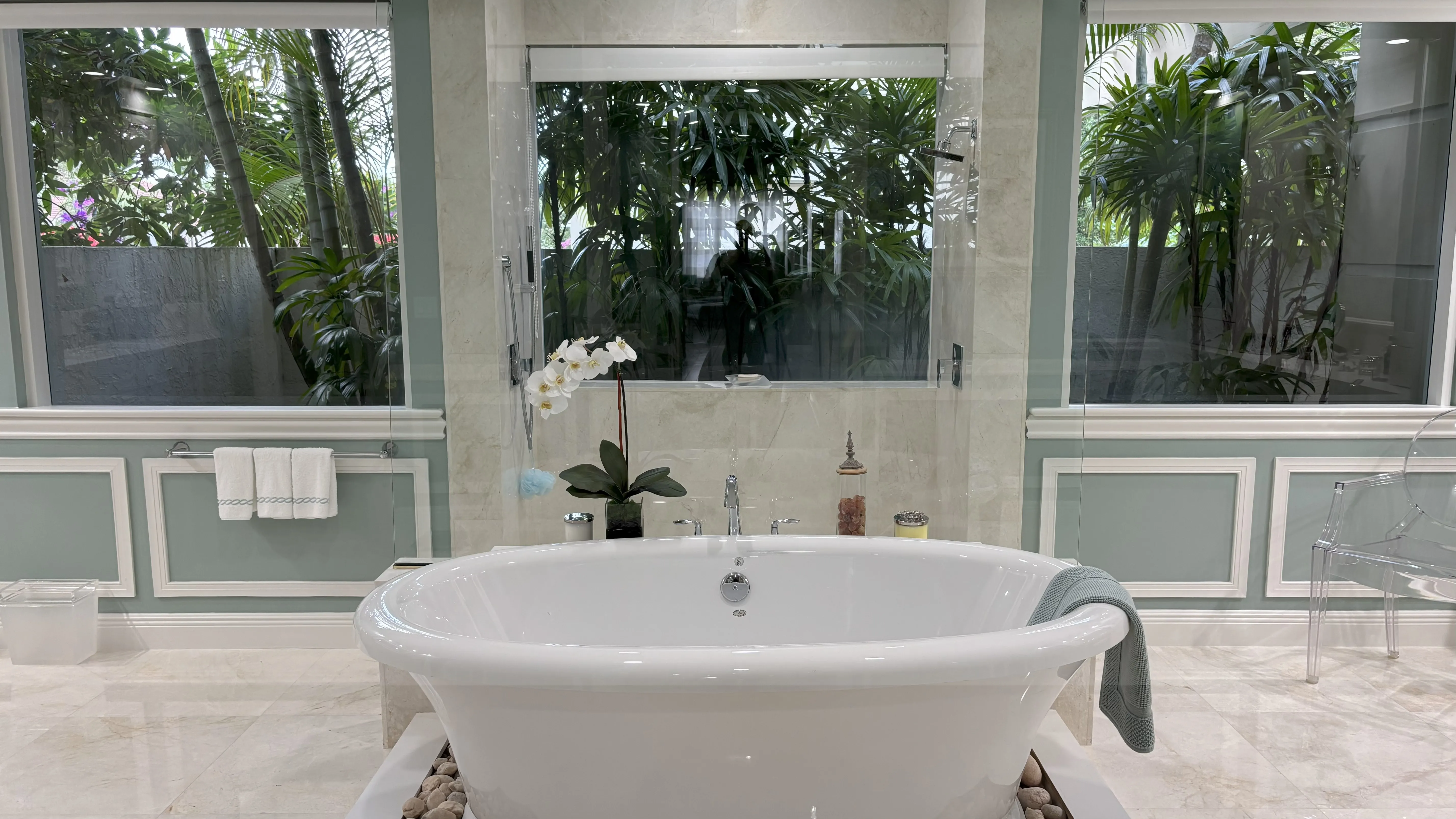 Elegant bathroom with freestanding tub highlighting deep cleaning detail